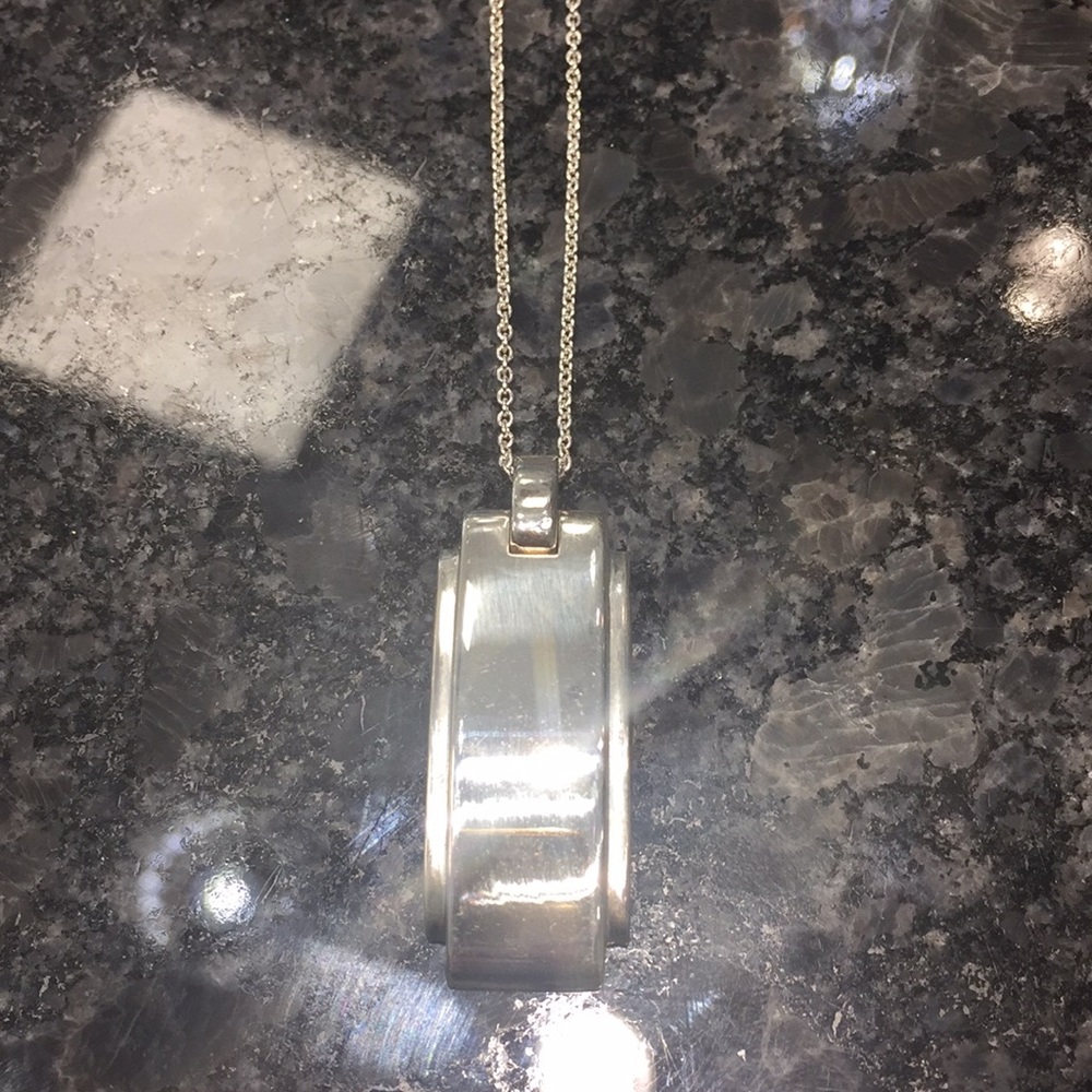 Tiffany & Co. dog tag pendant on cable chain
